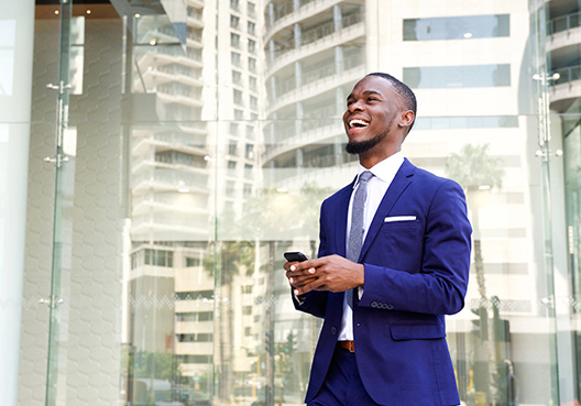 Plate Glass man standing in front of the building